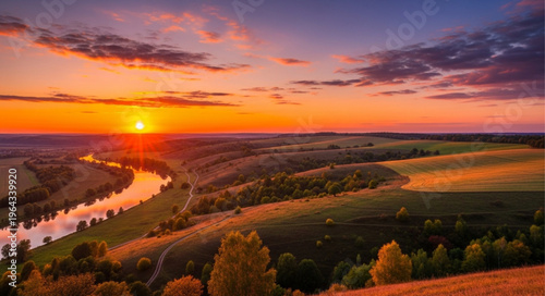 Sunset over rural landscape fields.