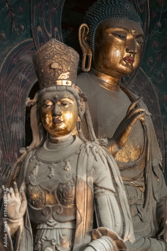 Fototapeta premium Exquisite Color-painted Sculpture and Ancient Architectur in Huayan Temple, Datong, Shanxi, China, Liao Dynasty. 