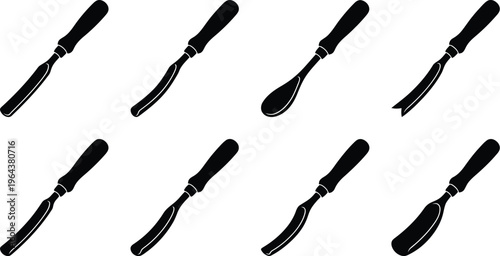 Set of eight black silhouette icons of wood carving chisels with different blade shapes on a white background