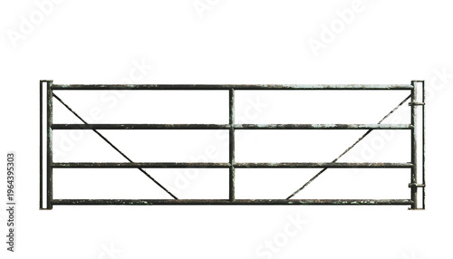 A rustic metal gate stands alone in a rural landscape.