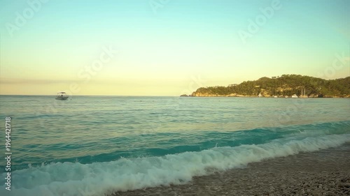 Tropical Beach at Sunrise with Gentle Waves