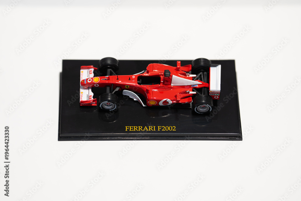 Obraz premium Bucharest Romania 29 march 2026.Detailed scale model of a 2002 Ferrari Formula 1 race car, inspired by the legendary Scuderia Ferrari design.