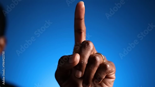 Hand pointing up gesture.