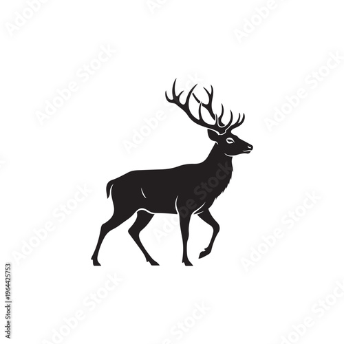 Black silhouette of a deer with large antlers walking to the right side