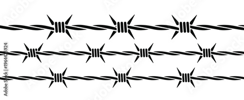 Barbed wire perimeter at prison yard