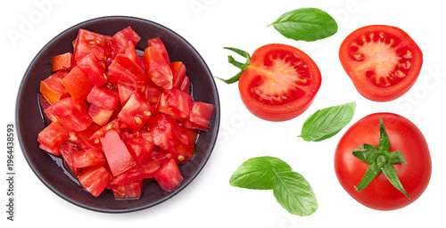 zest of red tomatoes on black plate isolated on white background. clipping path