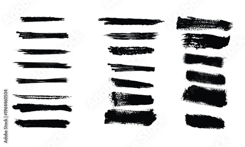 Black grungy brush strokes on white background for painting or drawing. Grungy brushes collection.