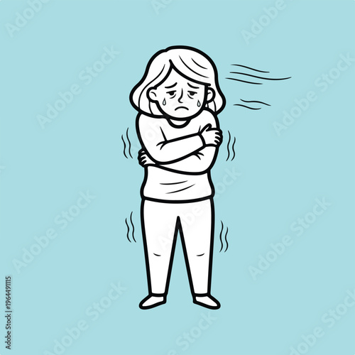 Woman feeling cold and shivering with crossed arms on blue background