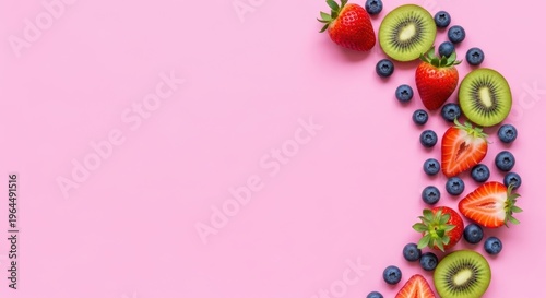 Fresh Fruit Arrangement on a Pink Background for Creative Ideas