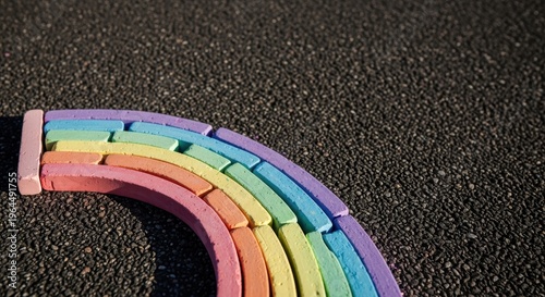 Colorful Chalk Rainbow Art on Textured Asphalt Background