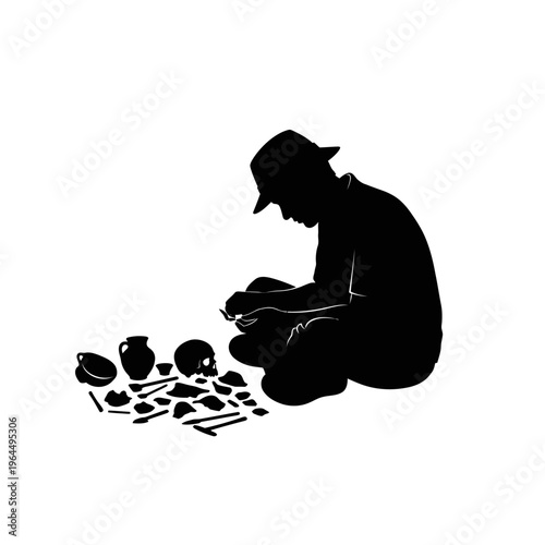 Silhouette of an archaeologist examining ancient artifacts with care and precision.