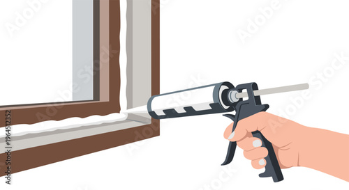 A human hand, wearing a gray sleeve, is operating a caulk gun to apply a white sealant bead along a brown wooden window frame.