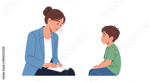 A female therapist in a blue blazer, holding an open book, sits facing a young boy who is seated opposite her against a plain white background.