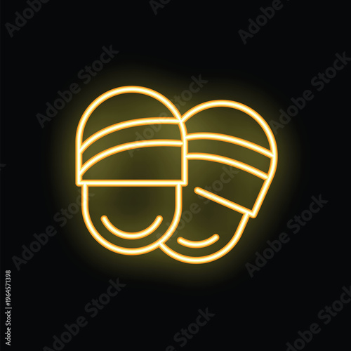 Yellow neon sign showing a pair of smiling slippers, probably on a window display