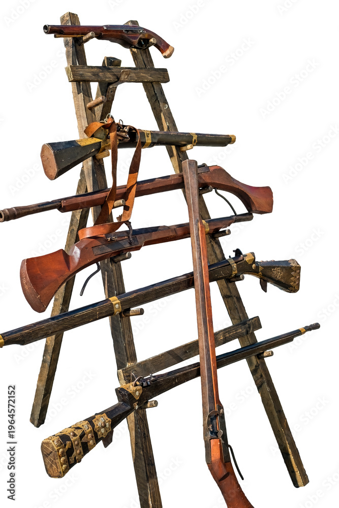 Fototapeta premium a variety of historical weaponry, primarily featuring various types of matchlock muskets