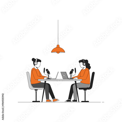 Two people recording podcast conversation using microphones and laptops at table.