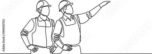 Two construction workers in hard hats pointing and looking ahead