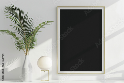 A serene landscape painting in a gold frame on a white shelf with a plant and lamp