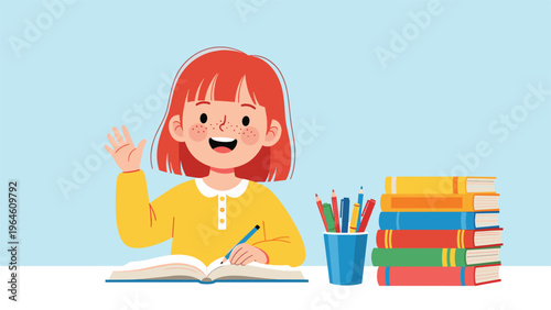 Happy school girl with red hair sitting at a desk with books and pencils while raising her hand and writing in her notebook.
