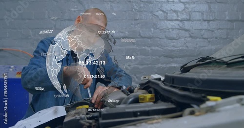 Auto mechanic gripping screwdriver and tightening bolt at hood, data globe crossing torso, securing