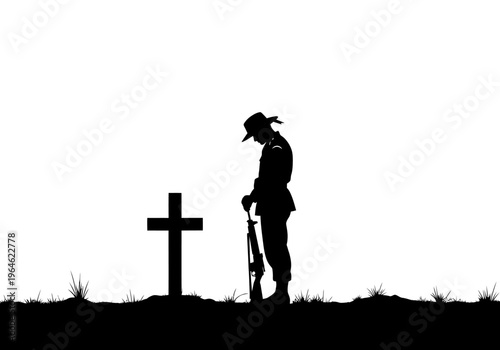 Silhouette of a Soldier Mourning at a Cross Grave for Remembrance Day and ANZAC Day Tributes