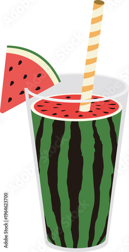 Chilled watermelon ade with a straw in a green striped glass