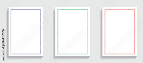 Three blank pages with intricate geometric borders