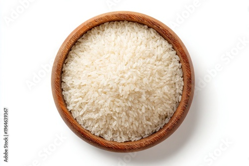 Wooden bowl with parboiled rice