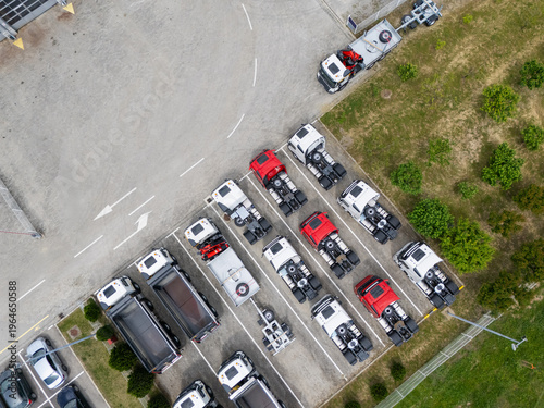 Wallpaper Mural Aerial view of a large fleet of new commercial trucks at a dealership Torontodigital.ca