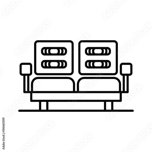 Two connected medical beds equipped with monitors and support armrests for patient care and comfort in a clinical setting
