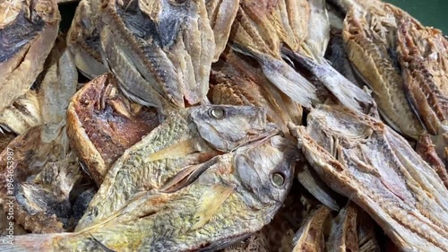 A traditional Indonesian side dish of fish preserved in salt and dried in the sun. A local dish from North Sulawesi sold in markets.
