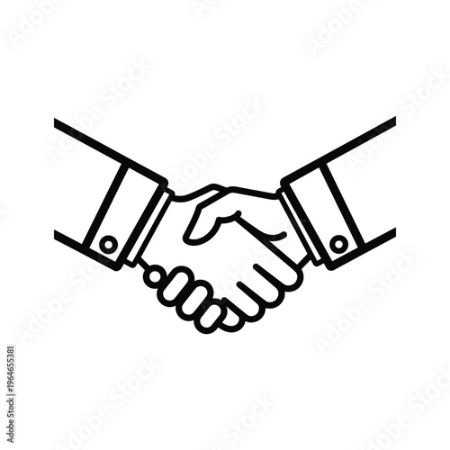 Two hands shaking in a firm and amicable handshake symbolizing agreement, partnership, or successful collaboration between individuals