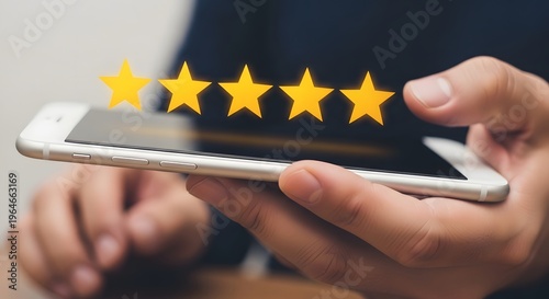 Person holding a smartphone displaying a five-star rating interface