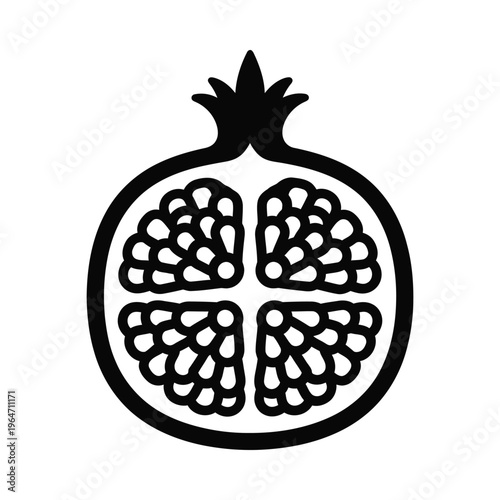 A black and white image of a pomegranate cut in half