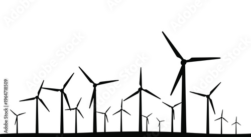 Black wind turbines against a bright sky a striking silhouette