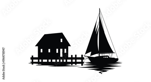 Coastal scene featuring a sailboat and house dramatic silhouette