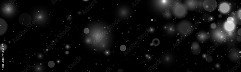 Fototapeta premium Falling white glitter sparkles drift softly across a dark scene. Tiny particles shimmer like tiny lights. Perfect overlay for Christmas, New Year, and magical designs.