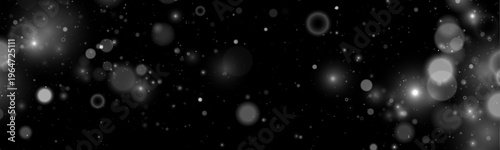 Falling silver dust sparkles create a magical luminous effect. Tiny particles drift softly across a dark transparent background. Perfect overlay for festive and holiday designs.