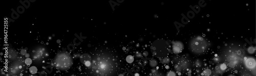 Foto Shimmering white dust sparkles float softly across a dark scene