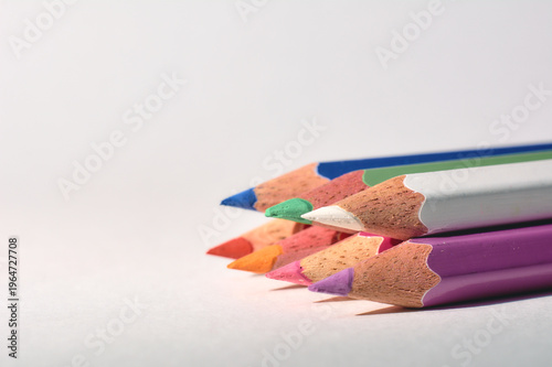 colored pencils on white background