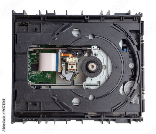 Optical disc drive interior revealing the laser lens assembly, spindle motor and circuit board components