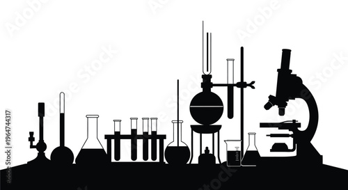 Laboratory equipment in a stark black silhouette