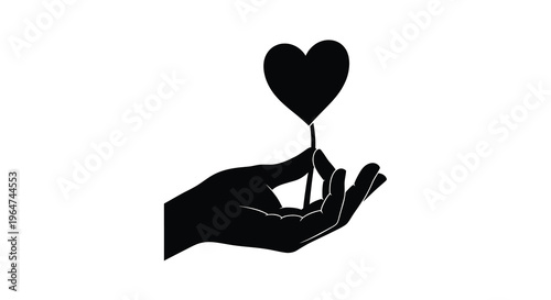 A hand gently holding a heart shaped object black silhouette