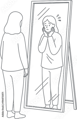 Unhappy woman viewing her reflection in a tall mirror feeling anxious about her physical appearance or body image concerns