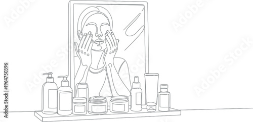 Woman gently applying skincare product around her eyes while looking at her reflection in the bathroom mirror with beauty supplies present