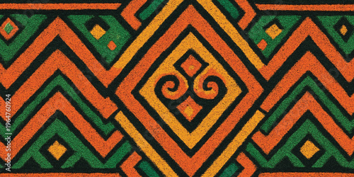 Abstract Vibrant green, orange, and yellow tribal pattern on fabric background with texture.