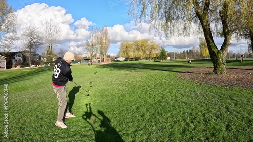 Slow motion approach wedge shot to the green