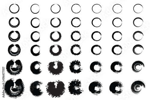 A series of black circles with varying degrees of erosion and degradation on a white background
