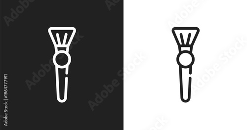 Inclined makeup brush icon. Linear black, white icon from beauty salon collection. Outline inclined makeup brush vector. Thin line symbol isolated on white and black background