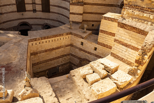 An ancient fortified city in the Nile Delta, located in the Coptic Cairo region. In ancient times, it was located in the Heliopolis nome, on the eastern bank of the Nile.